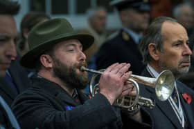A bugle player sounds The Last Post