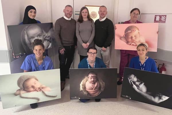 Lee Roberts, Carol Roberts, Stuart Roberts and the maternity staff with some of the pictures 