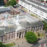 A review has found debt-servicing costs are causing significant pressure on Worthing Borough Council's finances