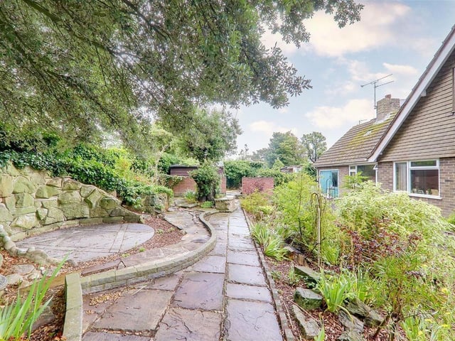 This versatile chalet bungalow with self-contained annexe has come on the market in Worthing with Bacon and Company priced at £625,000.