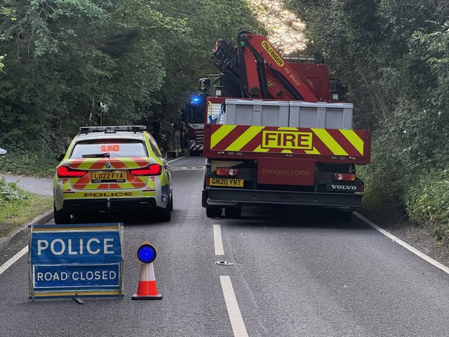 Firefighters and police at the scene of a fire in Henfield. Photo: Eddie Mitchell
