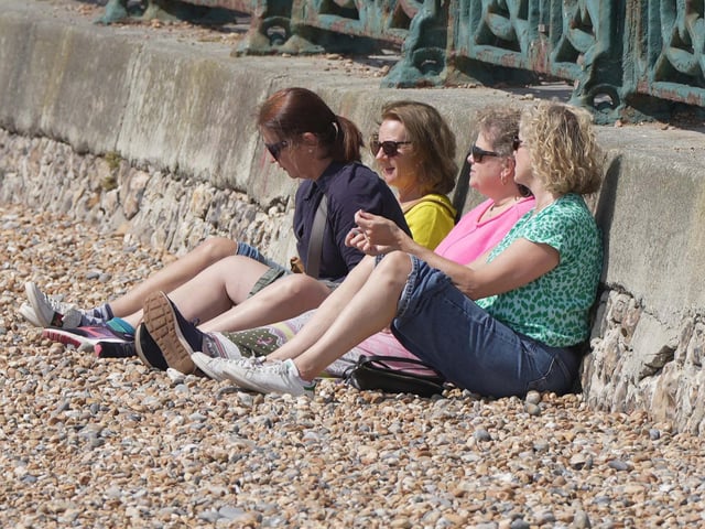 Residents soak up sun on Sussex beach ahead of Storm Lillian