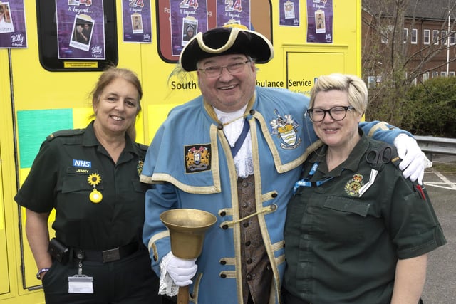 Worthing town crier Bob Smytherman with Jenny Mussell and Jess Mills from South East Coast Ambulance Service
