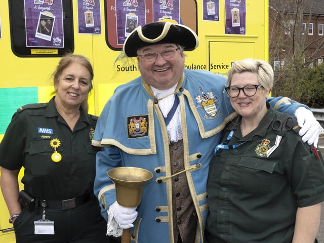 Worthing town crier Bob Smytherman with Jenny Mussell and Jess Mills from South East Coast Ambulance Service