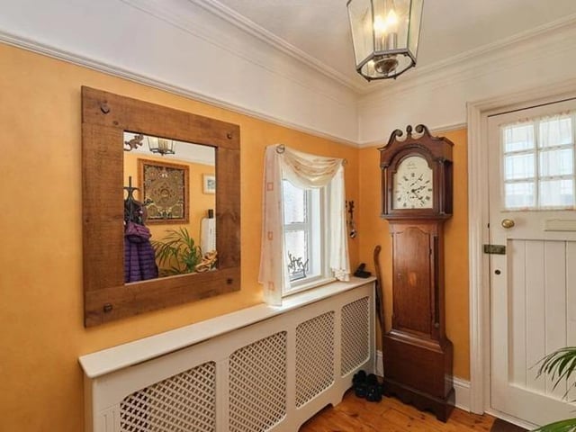 The property is a spacious semi-detached house, retaining many original features with accommodation comprising, to the ground floor, an entrance porch leading to the welcoming entrance hall with exposed wooden flooring, wood stripped inner doors, picture rails, under stairs storage, ceiling cornices and celling arch.