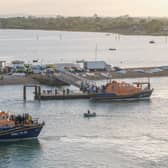 Around 140 migrants arrive in Portsmouth, Hampshire after being transferred from a single dingy south of the Isle of Wight in the English Channel by two RNLI lifeboats, a mammoth operation is talking place on Sunday evening to process the illegal migrants, with dozens of government workers from Police, Border Force, Ambulance and Fire crews, along with a number of transport busses.  Dated 06/09/26.