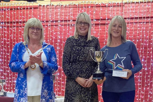 Tracey Hunt, who won the Geoff Miles Memorial Trophy for best residential front garden, with Rustington Parish Council chairman Alison Cooper and Nicola Miles