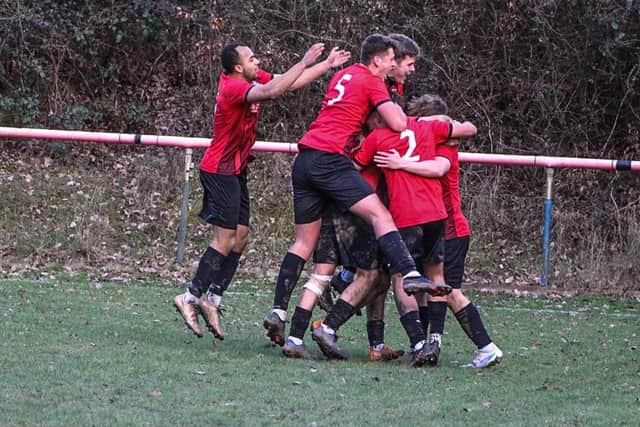 AFC Uckfield celebrate a goal in their win over Horsham YMCA