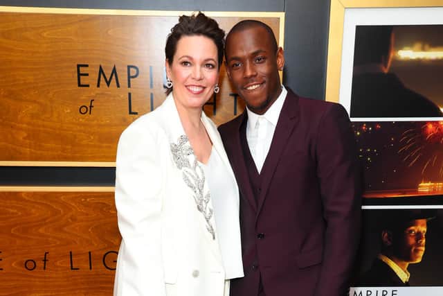 Hilary (Olivia Colman), a woman with a difficult past and an uneasy present, is part of a makeshift family at the old Empire Cinema on the seafront. When Stephen (Micheal Ward) is hired to work in the cinema, the two find an unlikely attraction and discover the healing power of movies, music and community. (Photo by Leon Bennett/Getty Images)