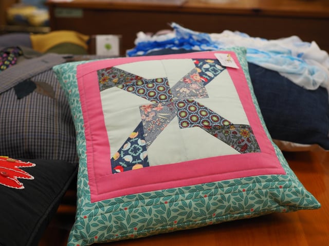 The cushion competition was held at St Peter and St James Hospice shop in South Road, Haywards Heath, on October 1