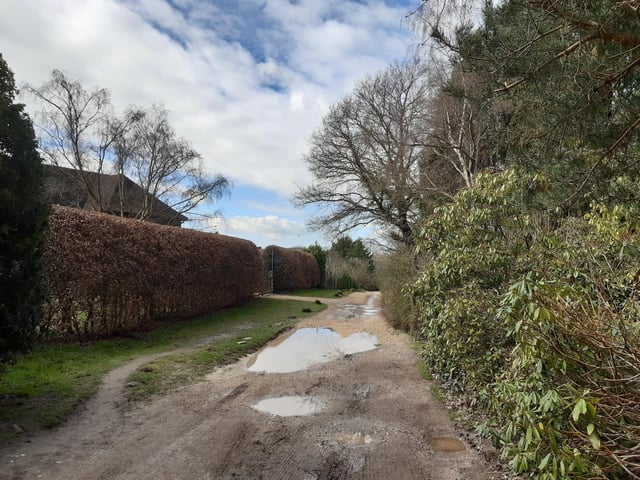 Follow the path straight on to the next exit into Woodpecker Lane, seen here