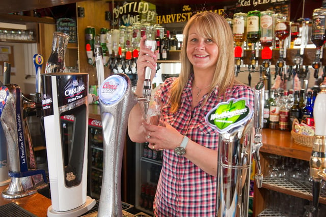 Inside the The Harvest Home, Copnor Road, Copnor pub in 2015. Pictured: Pub manager, Julie Franics. Picture: Allan Hutchings (150728-571)
