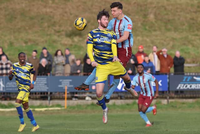 Tom Chalmers wins a header in Hastings United's win over Hashtag United - get the reaction in the Hastings Observer and on this website on Friday | Picture: Scott White