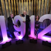 James Bowker, Mr E Lewis and Catherine Clifford at the Lansdowne Hotel's celebration