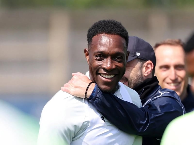 De Zerbi gives his striker a hug in training. Welbeck is out of contract this summer but is close to agreeing a new deal