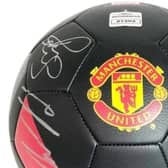 A £10 raffle to win a signed Manchester United football is planned