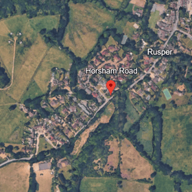 Stonebond Properties (Guildford) Ltd has applied to vary two planning conditions for the development, off Horsham Road. Photo: Google Earth