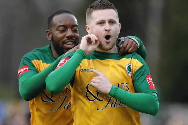 Tom Richards celebrates slotting home a late penalty in Horsham's dramatic 2-0 home win over Wingate & Finchley. Pictures by John Lines