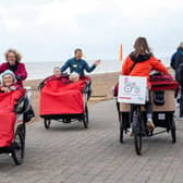 Life is a  breeze . . . . King's award winners Pedal People in seafront action