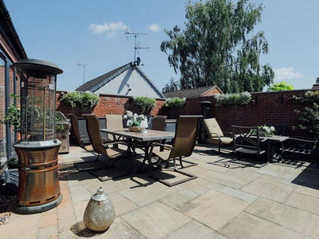 The six-foot-high brick walls that surround the courtyard typify the security and privacy that can be found at the £490,000-plus property. Access to the courtyard can only be gained via an electric-coded key fob.