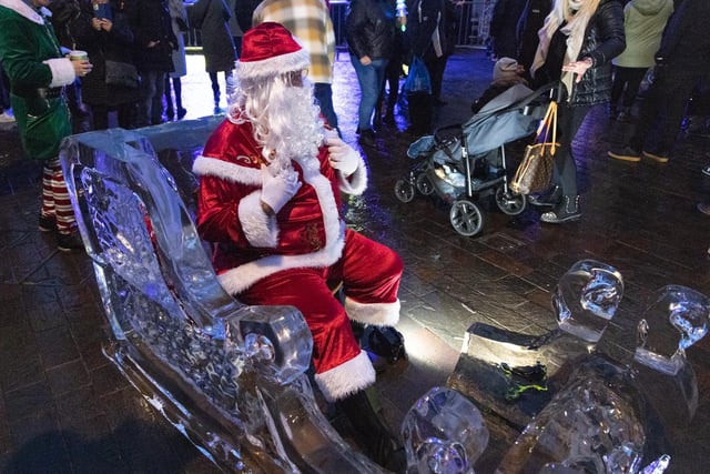 Santa settles into his sleigh. Photo: Neil Cooper.