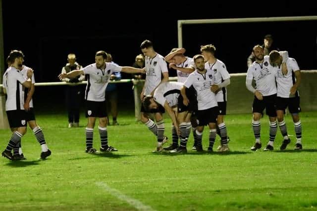 Bexhill United celebrate one of the three goals that saw off Eastbourne Town | Picture: Joe Knight