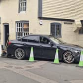 Photos have emerged from Alfriston High Street after a car collided with a building. Photo: Dan Jessup