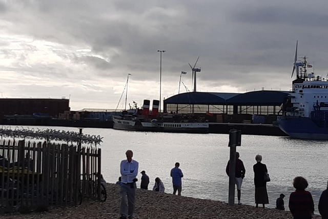 Amazing, stunning, emotional - the large crowd that stood on Kingston Beach to watch the world’s last seagoing paddle steamer make its inaugural visit to Shoreham was visibly moved by the sight of the Waverley making its way in and out of the harbour on Wednesday, September 13.