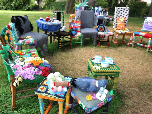 East Preston Yarnbombers have created an enchanting picnic area with chairs that are beautifully-decorated knitted masterpieces