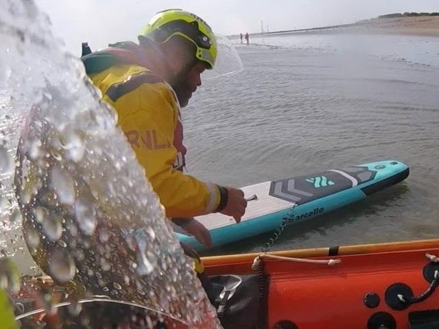 Two young girls were safely rescued by volunteer lifeboat crews after being swept around half a mile offshore, while paddleboarding off Selsey Bill.