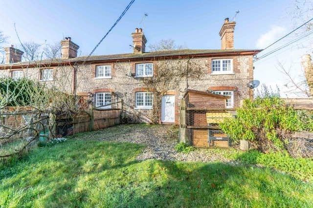 A picturesque, flint fronted Duke of Norfolk Estate cottage.