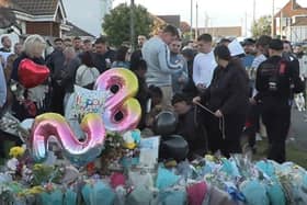 More than a hundred people gathered on the A259 at Bramber Avenue for Arthur’s 28th birthday with cakes, flowers and balloons.