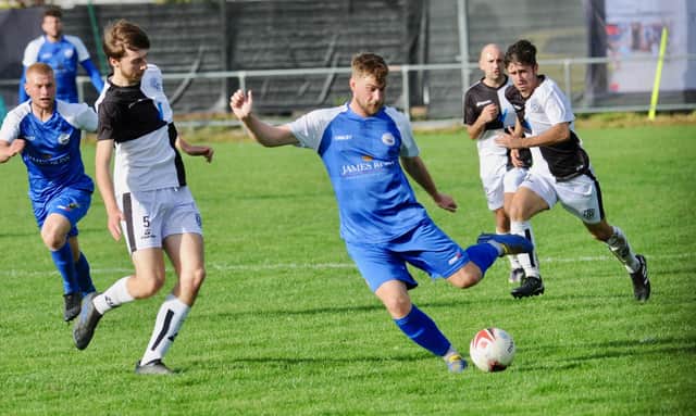 Action from Shoreham's 4-2 win at East Preston in division one of the Southern Combination League