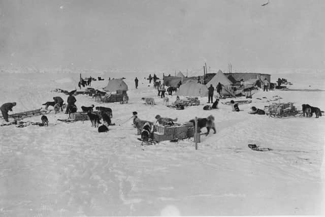 The Antarctica expedition team at work on a camp site circa 1914. Photo by Hulton Archive / Getty Images