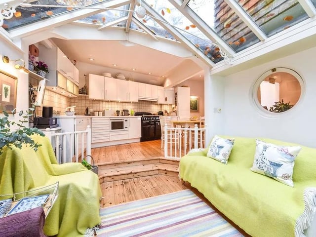 The west facing conservatory looks out across the garden