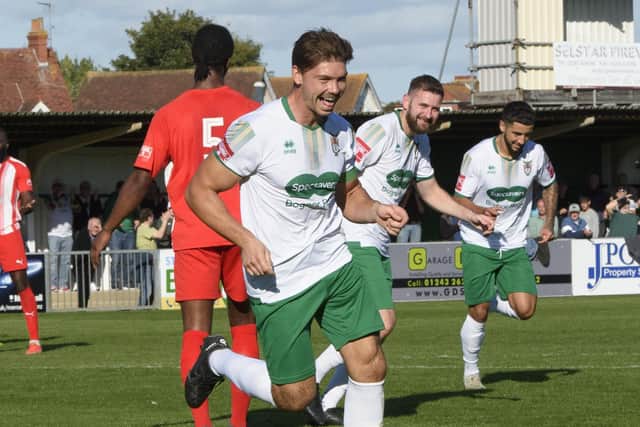 Craig Robson runs off to celebrate what proved to be the Bognor winner against Bowers | Picture: Tommy McMillan