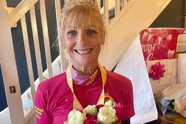 Mary Austin-Olsen celebrating her 70th birthday after her marathon run | Contributed by Run Wednesdays