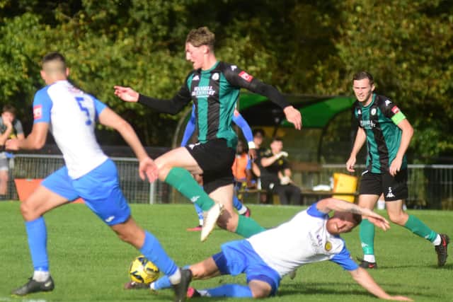 Action from Burgess Hill Town's win against Merstham. Picture: Phil Dennett