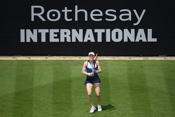 Harriet Dart of Great Britain looks on against Zhang Shuai of China in the Women's Singles First Round match