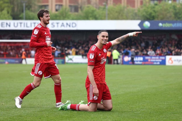Crawley Town's Klaidi Lolos celebrates scoring 2-0:Action in the Crawley Town-Grimsby game that the Reds won to secure a play-off place