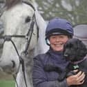 Kirsty pictured with her horse, Hero, and RSPCA rescue dog, Ozzie. Photo: RSPCA
