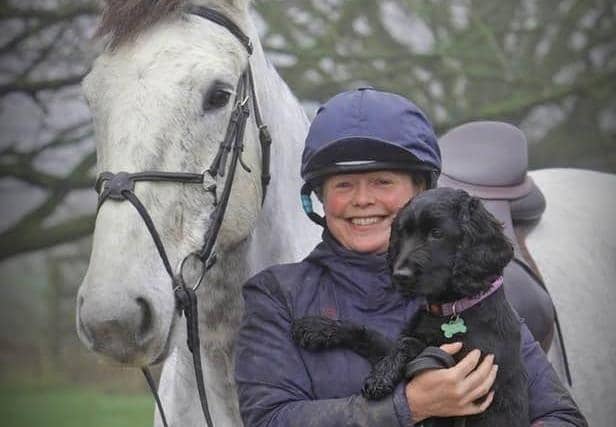 Kirsty pictured with her horse, Hero, and RSPCA rescue dog, Ozzie. Photo: RSPCA