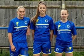 Some of the Haywards Heath Town Women's players in the new kits, sponsored by Outbound b2b | Picture: Ray Turner