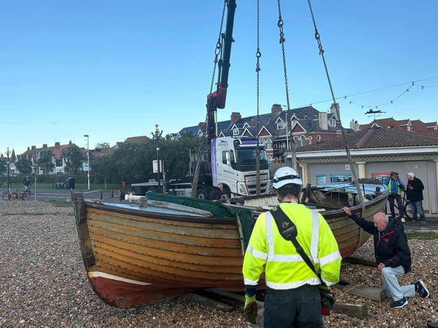 An historic clinker-built fishing boat was lowered down onto Worthing Beach ahead of restoration works.