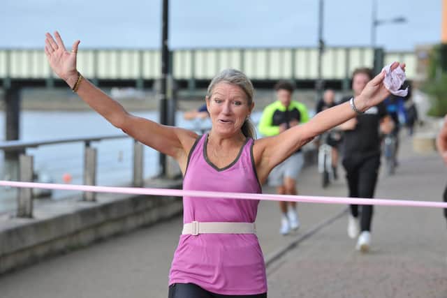 Veronica Sullivan ran the last of 12 half marathons in memory of her friend Louise Lydon-James, who died last year from cancer. Pic S Robards SR2210221