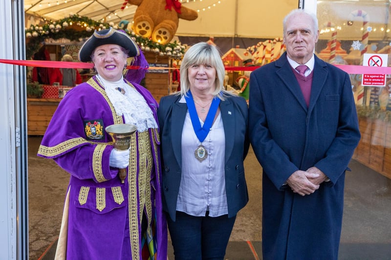 Town crier Jane Smith, Vice-chair of the council Alison Cooper and mayor John Barrett. Photo: Neil Cooper