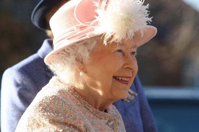 The Queen smiles as she visits the Chichester Festival Theatre 