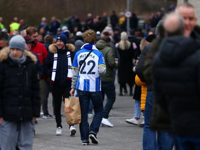 BRIGHTON, ENGLAND - MARCH 04: Fans arrive at the stadium prior to during the Premier League match between Brighton & Hove Albion and West Ham United at American Express Community Stadium on March 04, 2023 in Brighton, England. (Photo by Charlie Crowhurst/Getty Images)