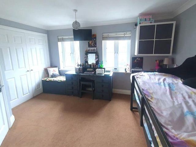 Bedroom two on the second floor has an en-suite shower room