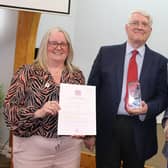 Jo Hughes, Mike Nicholls (Chairman of Selsey Community Forum) and Dame Emma Barnard (Lord-Lieutenant of West Sussex) with the Award.